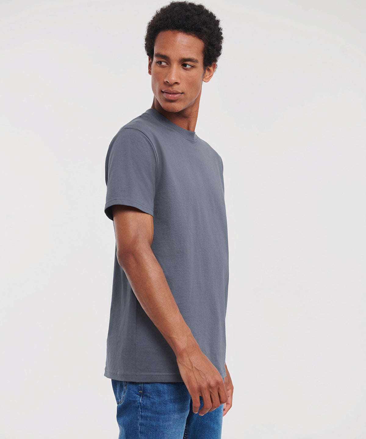 Side on image of model wearing Russell Super Ringspun Classic T Shirt